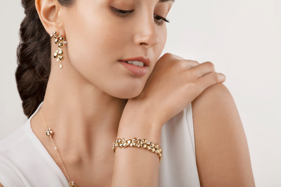 Ischia earrings in 18kt yellow gold set with white diamonds (2.74 carats)