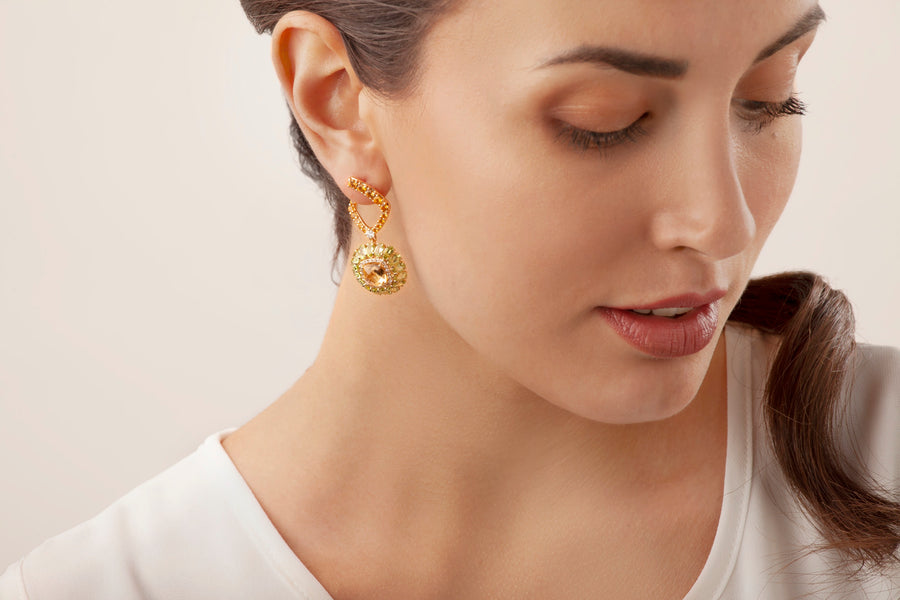 Procida earrings in 18kt yellow gold set with white diamonds, peridot, and citrine