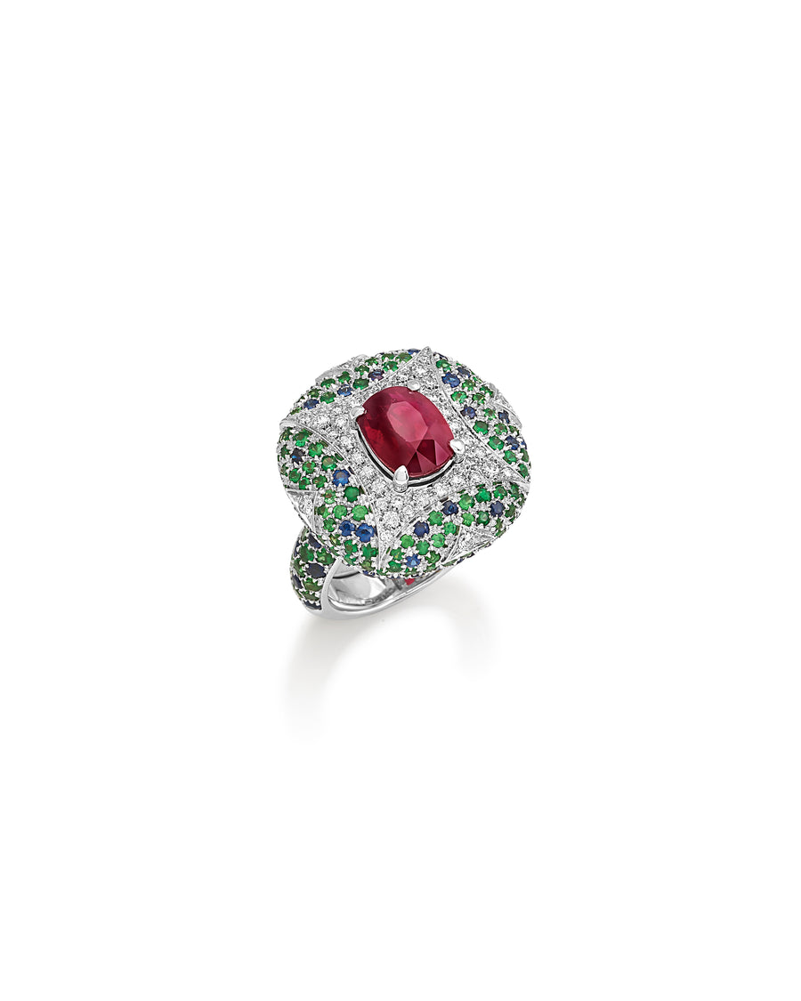 Ring in 18kt white gold set with white diamonds (0.45 cts), tsavorite (2.14 cts), blue sapphires (1.52 cts), and cushion cut ruby (3.04 cts)