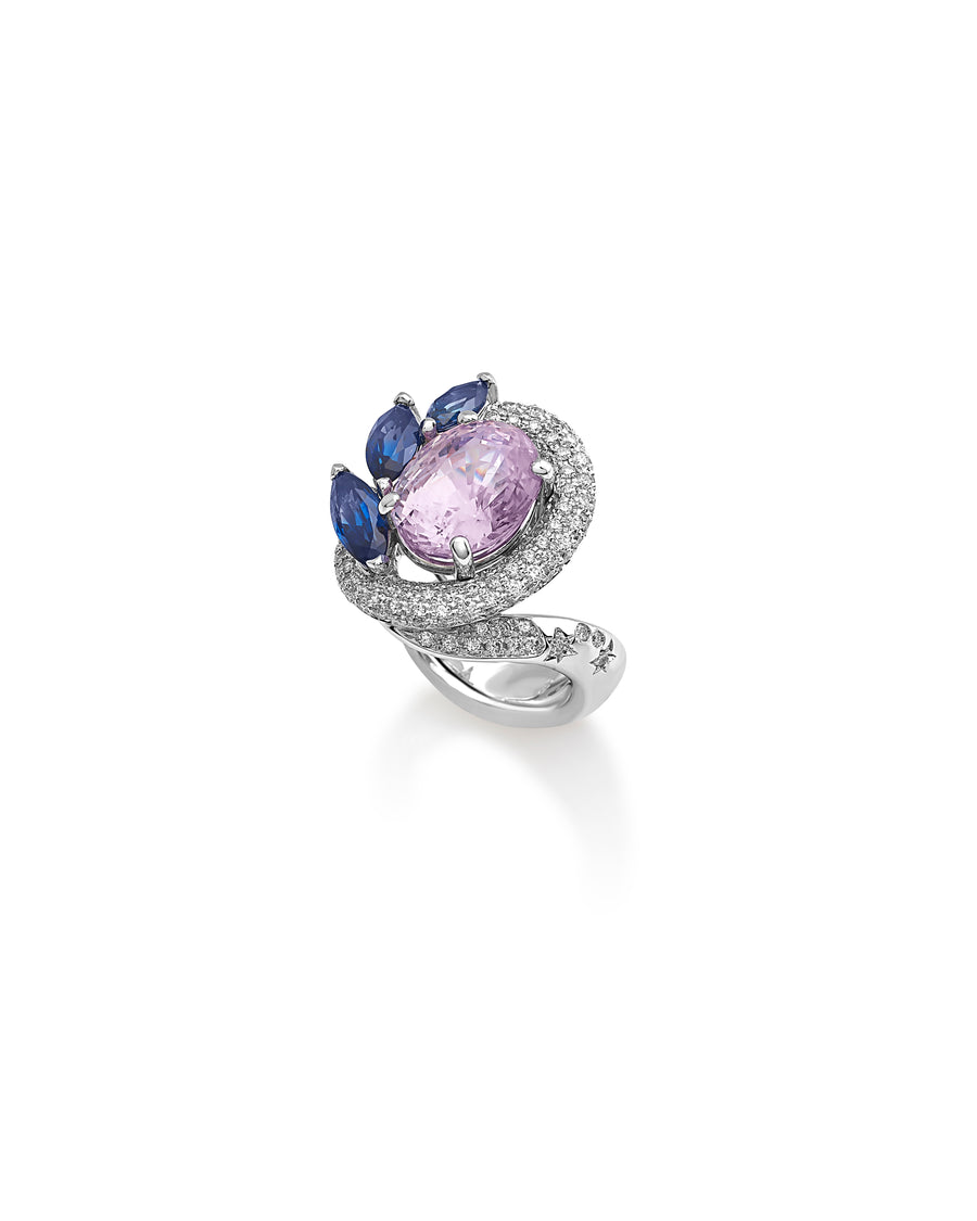 Ring in 18kt white gold set with white diamonds (0.74 cts), marquise shape blue sapphires (1.55 cts), and oval shape pink (padparadscha) sapphire (5.84 cts)