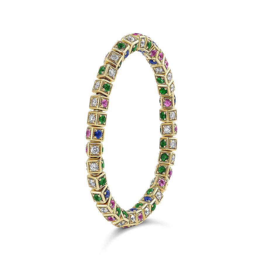 Faro stretch bracelet in 18K yellow gold set with white diamonds, pink and blue sapphires, and tsavorite
