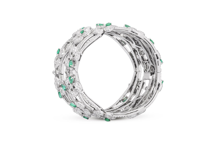 Ischia large bracelet in 18kt white gold set with white diamonds (13.28 carats) and emeralds (5.14 carats)
