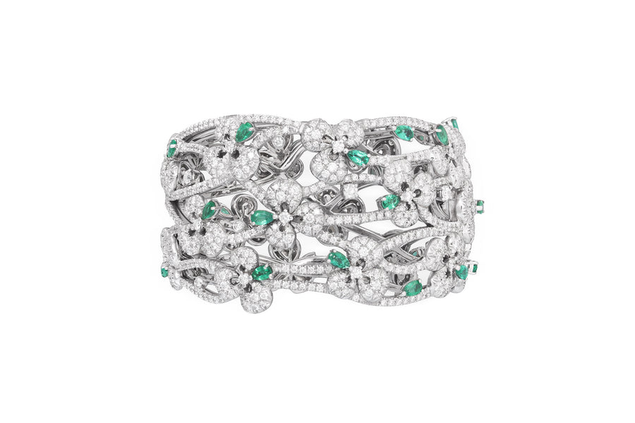 Ischia large bracelet in 18kt white gold set with white diamonds (13.28 carats) and emeralds (5.14 carats)
